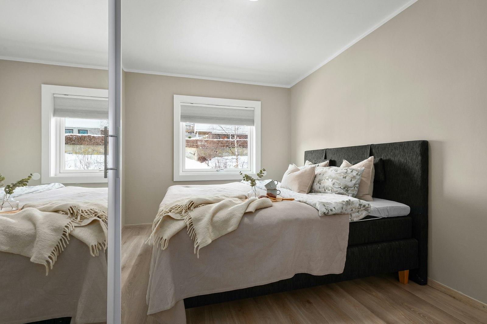 Modern furnished bedroom — premium 2BHK apartment interior